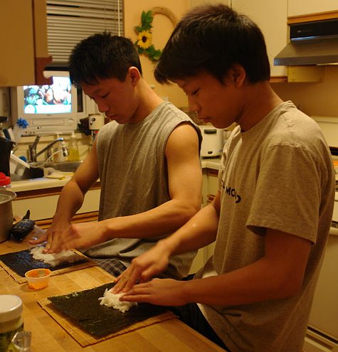 Eric and Noah making sushi